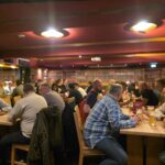 Recepción nocturna del evento FOKUS Automic 2026 en el Brauhaus Ernst August de Hannover: encuentro entre miembros y socios tras la primera jornada